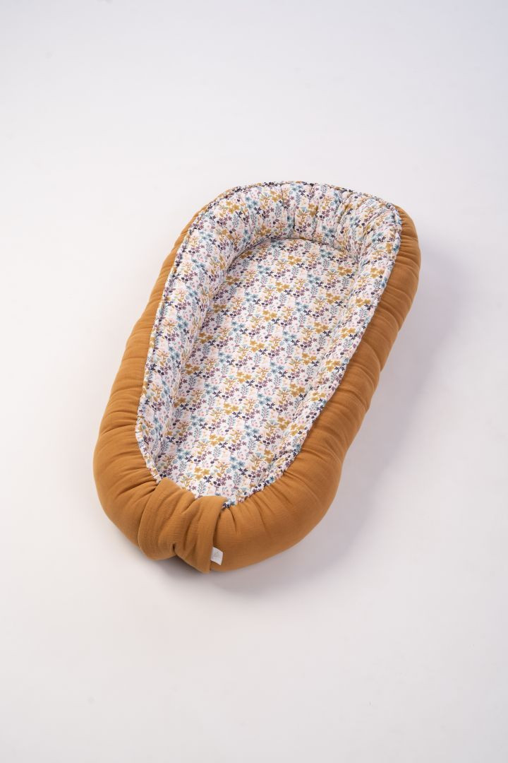 Babynest Bunter blumengarten zimt